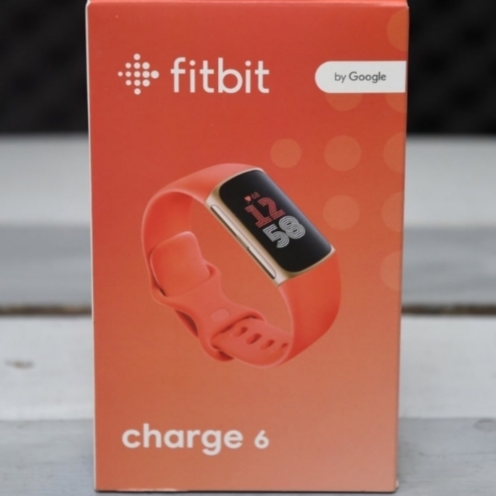 Fitbit Charge 6 NEW IN BOX!! NEVER OPENED OR USED!!! Coral Color! Nice!!